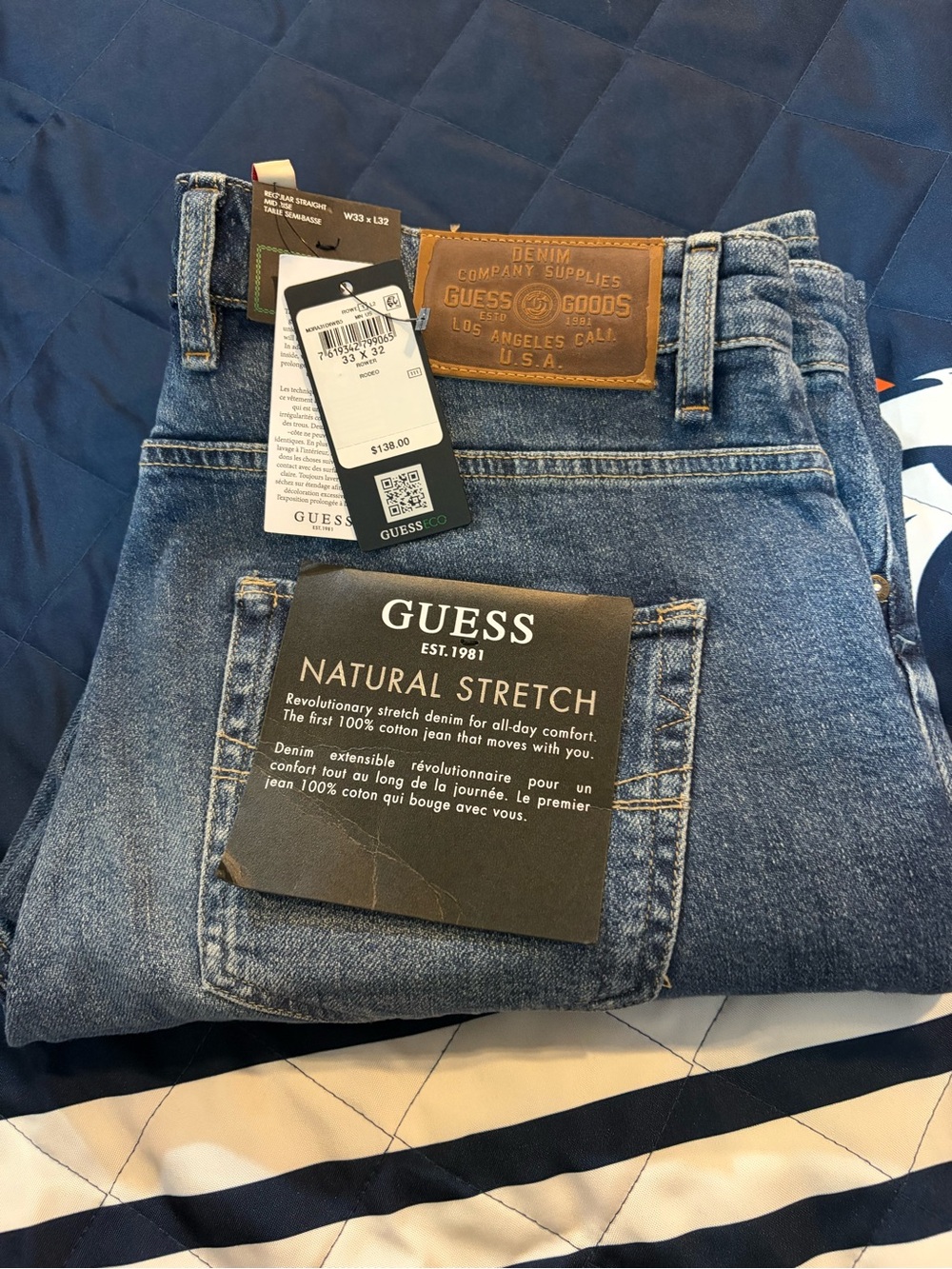 GUESS Men's Blue Relaxed Fit Jeans with Leather Patch